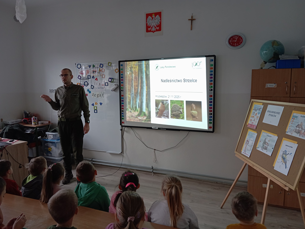 Grafika ilustrująca uczestników spotkania