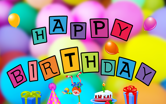 balony, klaun, tort i napis urodzinowy